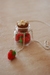Sautoir petit pot de verre et fraises